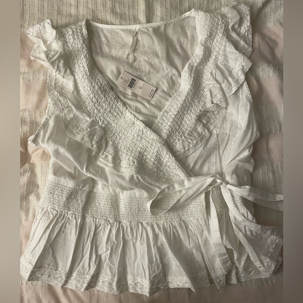 Anthropologie Deep-V Ruffled Linen Blouse